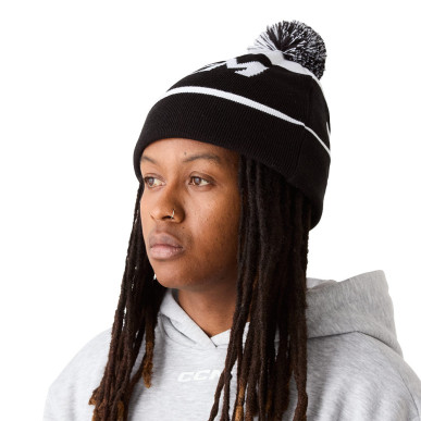 Bonnet CCM à pompon en tricot doublé polaire