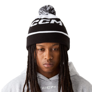 Bonnet CCM à pompon en tricot doublé polaire